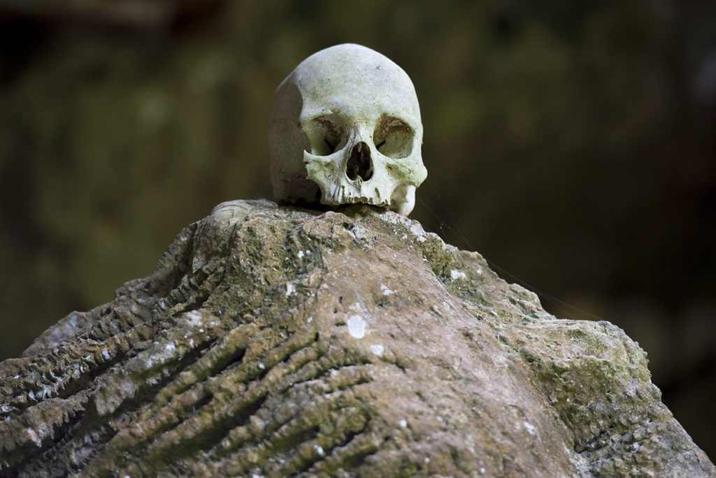 Burial cave called Londa in Tana Toraja, Indonesia, with tau-tau statues and skulls