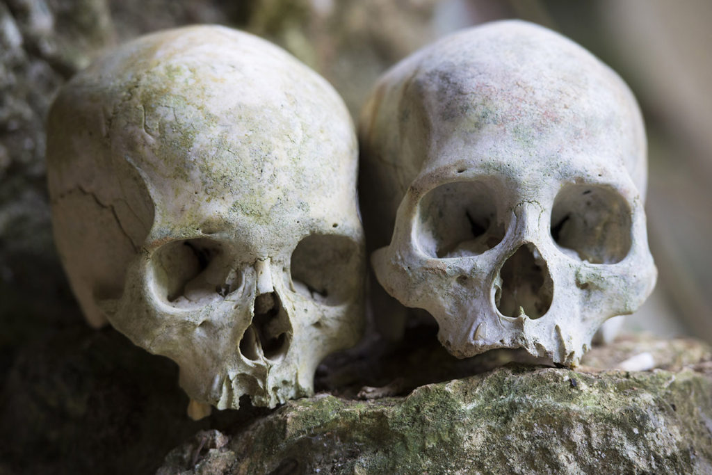 Burial cave called Londa in Tana Toraja, Indonesia, with tau-tau statues and skulls