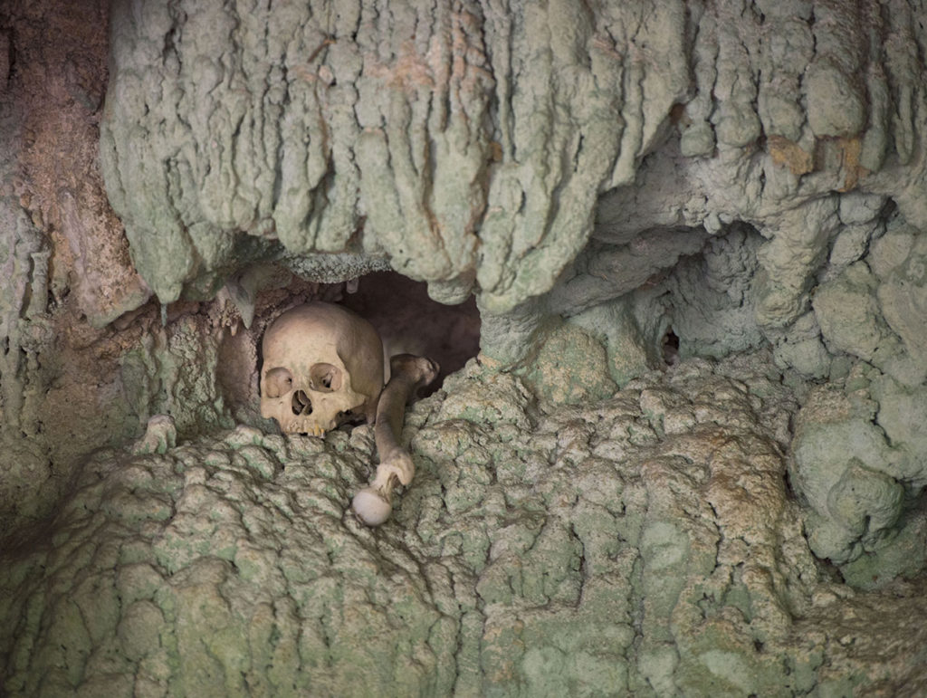 Burial cave called Londa in Tana Toraja, Indonesia, with tau-tau statues and skulls