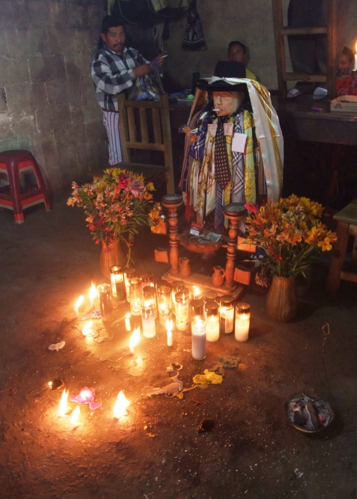 A shrine to Mayan deity and folk saint, Maximón, in Santiago Atitlán, Guatemala.