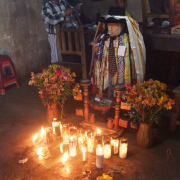 A shrine to Mayan deity and folk saint, Maximón, in Santiago Atitlán, Guatemala.