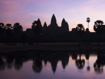 The sun rises over Angkor Wat in Cambodia.