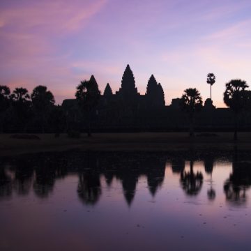 The sun rises over Angkor Wat in Cambodia.